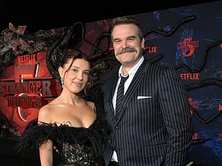 Millie Bobby Brown and David Harbour at Netflix's "Stranger Things" Season 5 World Premiere at TCL Chinese 6 Theatres on November 06, 2025 in Hollywood, California.