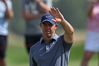 Ireland's Rory McIlroy gestures after playing a shot on the 7th hole during the European Tour of Abu Dhabi Championship 2025 golf tournament in Abu Dhabi on November 9, 2025.
