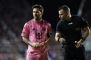 Referee Rosendo Mendoza talks to Lionel Messi #10 of Inter Miami CF during the 2025 MLS Cup Playoff match between Inter Miami CF and Nashville SC at Chase Stadium on November 08, 2025 in Fort Lauderdale, Florida.