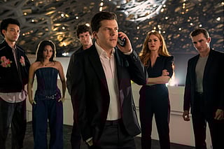 Justice Smith, Ariana Greenblatt, Dominic Sessa, Jesse Eisenberg, Isla Fisher and Dave Franco in a scene from "Now You See Me: Now You Don't." 