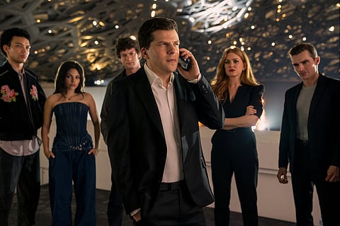 Justice Smith, Ariana Greenblatt, Dominic Sessa, Jesse Eisenberg, Isla Fisher and Dave Franco in a scene from "Now You See Me: Now You Don't." 