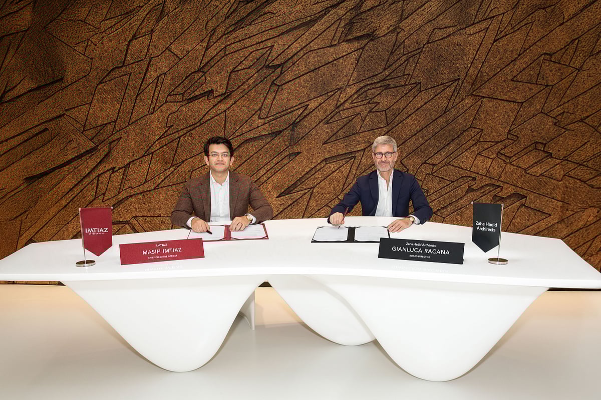 Masih Imtiaz, CEO of Imtiaz Developments, and Gianluca Racana, Director at Zaha Hadid Architects, at the signing ceremony at the Zaha Hadid Headquarters in London