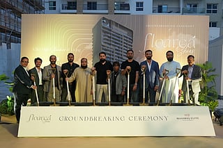 From left to right: Muhammad Anees, Aurangzeb Amin Pariyani, Faisal Hussain, Umair Saleem, Kamran Muhammad, Muhammad Mustafa, Bilal Hussain, Aamil Tabani, and Farhan Hussain