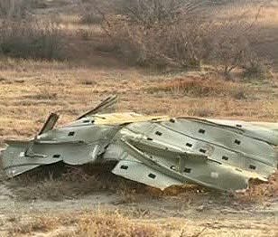 Footage shows plane spinning and crashing, sending up thick black smoke