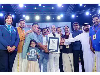 Vini International leaders, including Jagadeesh Manghat, Sales Director; Shaijan George, Business Head of the Realman Division and Rakesh Purohit, Sales Manager of Ossum, are receiving the Guinness World Record set by RealMan & Ossum by Vini International for Maximum People Applying Body Spray Simultaneously in Dubai on September 28. Also seen in the picture are the Event Coordinator Benny Thomas, Indian Consul General in Dubai Satish Kumar Sivan, AKCAF President Paul T Joseph, and other dignitaries