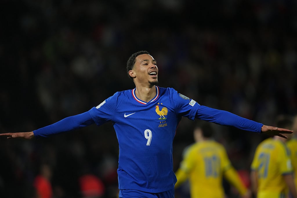 France's Hugo Ekitike celebrates his side's fourth goal during a World Cup 2026 group D qualifying soccer match between France and Ukraine in Paris, Thursday, Nov. 13, 2025. (AP Photo/Christophe Ena)