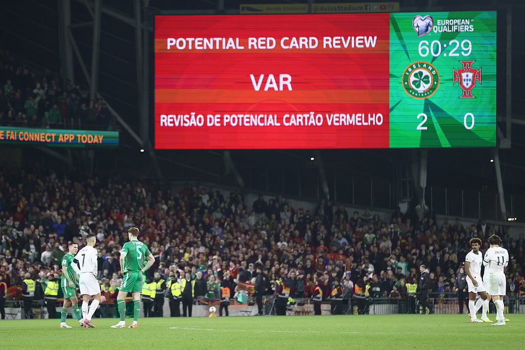 A VAR check on Portugal's Cristiano Ronaldo red card displays the decision was correct during a World Cup 2026 group F qualifying soccer match between Ireland and Portugal in Dublin, Thursday, Nov. 13, 2025. (AP Photo/Peter Morrison)