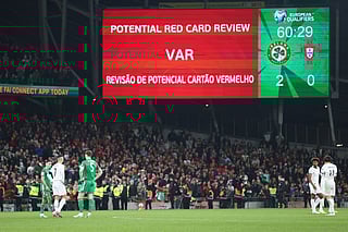 A VAR check on Portugal's Cristiano Ronaldo red card displays the decision was correct during a World Cup 2026 group F qualifying soccer match between Ireland and Portugal in Dublin, Thursday, Nov. 13, 2025. (AP Photo/Peter Morrison)