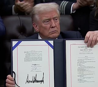 A screengrab shows US President Donald Trump after he signed the bill to end the government shutdown following House passage of the legislation.