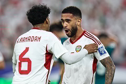 Iraq's midfielder #17 Ali Jasim vies for the ball with UAE's defender #2 Ruben Canedo during the FIFA World Cup 2026 Asian qualifier football match between the United Arab Emirates and Iraq at the Mohammed bin Zayed Stadium in Abu Dhabi on November 13, 2025.