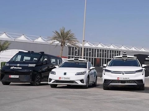 Swanky fleet of WeRide and AutoGo driverless cars in Abu Dhabi.