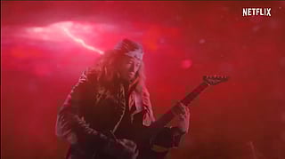 In the scene, the character Eddie Munsen plays Master of Puppets. 