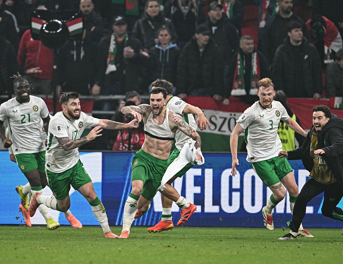 Ireland's forward #07 Troy Parrott (C) celebrates his 2-3 during the FIFA World Cup 2026 Group F European qualification football match betweem Hungary and Republic of Ireland at the Puskas Arena in Budapest, Hungary on Novemeber 16, 2025.