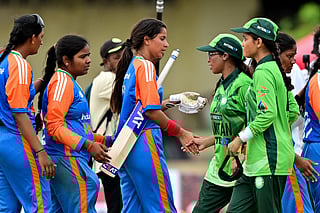 Pakistan's captain Nimra Rafique (3R) shakes hands with India's players at the end of the Women’s Blind Twenty20 World Cup 2025 match between India and Pakistan at the BOI Cricket Stadium in Katunayake on November 16, 2025.
