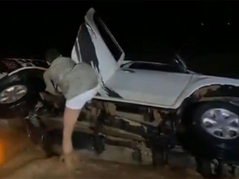 Three Saudis risk their lives to pull two Chinese from submerged vehicle swept by flash floods in Hail