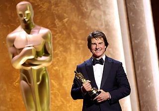 Honoree Tom Cruise poses onstage during the 16th Governors Awards at The Ray Dolby Ballroom on November 16, 2025 in Hollywood, California.