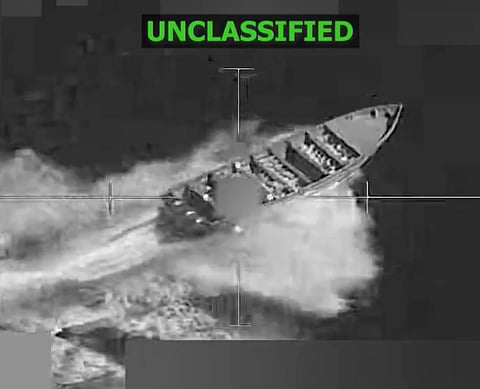 A screengrab of the alleged drug boat before it went up in a huge fireball, in a video uploaded by the US military's Southern Command.