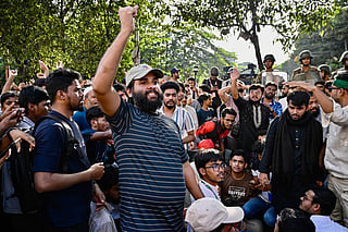 People celebrate the court's verdict after Bangladesh's former Prime Minister Sheikh Hasina was found guilty and sentenced to death in Dhaka on November 17, 2025.