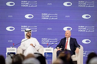 Omar Al Olama, Minister of State for Artificial Intelligence, Digital Economy and Remote Work Applications, and Michael Miebach, CEO of Mastercard, at the Dubai Future Forum 2025.