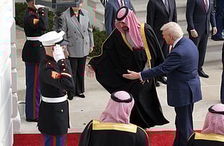 Trump  welcomes Mohammed bin Salman during an arrival ceremony at the White House on November 18, 2025 in Washington, DC. 