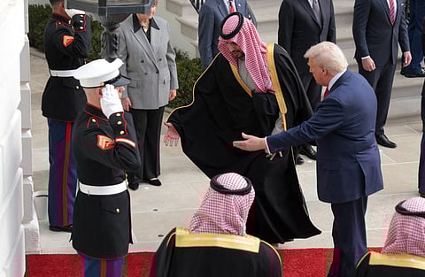 Trump  welcomes Mohammed bin Salman during an arrival ceremony at the White House on November 18, 2025 in Washington, DC. 