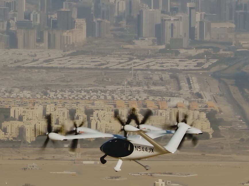 Joby’s air taxi en route from its flight test facility in Margham to Al Maktoum International Airport.
