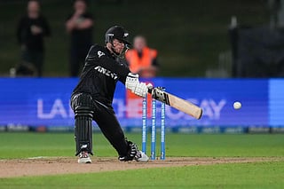 New Zealand captain Mitchell Santner plays a shot during the second one-day international cricket match against the West Indies at McLean Park in Napier on November 19, 2025.