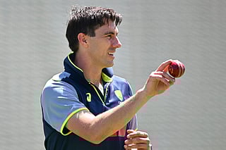 Australia’s Pat Cummins prepares to bowl during a practice session at Optus Stadium in Perth on November 20, 2025, ahead of the first Ashes cricket Test match between Australia and England.