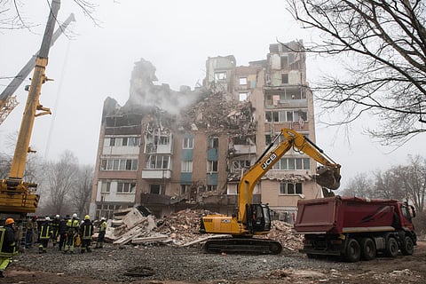 Ukrainian rescue personnel operate at the site of a heavily damaged residential building following Russian air strike in the city of Ternopil, on November 20, 2025, amid the Russian invasion of Ukraine.