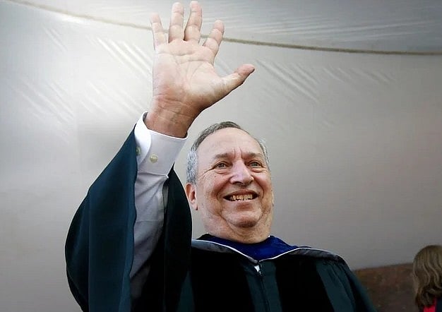 FILE -Former Harvard University president Larry Summers waves during Harvard commencement exercises, May 24, 2018, in Cambridge, Mass.