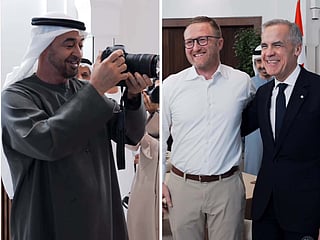 A candid moment as UAE President Sheikh Mohamed bin Zayed captures a photo of Canadian PM Mark Carney standing with a UAE-based Canadian photographer during the official engagement in Abu Dhabi.