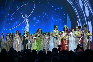 Miss Mexico Fatima Bosch (5th R) is surrounded by contestants as she celebrates winning the 2025 Miss Universe pageant in Nonthaburi, north of Bangkok, on November 21, 2025.
