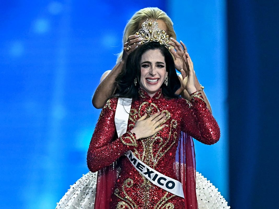 Miss Mexico Fatima Bosch (C) is crowned as she celebrates winning the 2025 Miss Universe pageant in Nonthaburi, north of Bangkok, on November 21, 2025.