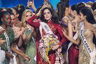 Miss Mexico Fatima Bosch, center, is celebrated by other contesters after winning the 2025 Miss Universe pageant in Nonthaburi, north of Bangkok, Thailand, Friday, Nov. 21, 2025. (AP Photo/Sakchai Lalit)