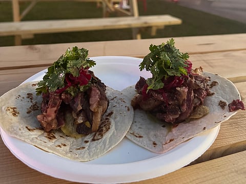 Wagyu beef taco with Chimichurri, pickled onion and lime from MIKA.