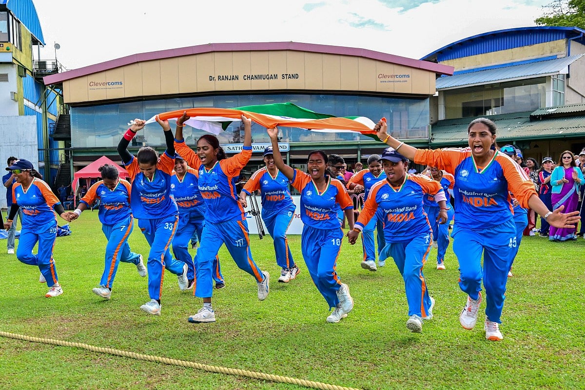 India's players celebrate after their team's victory in the first Blind Women's Twenty20 World Cup 2025 final match against Nepal at the P Sara Oval International Cricket Stadium in Colombo on November 23, 2025.