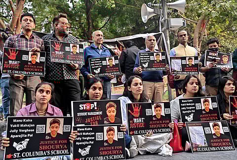 Parents hold a protest at Janar Mantar over the death of a 16-year-old student, allegedly by suicide, at Rajendra Place Metro Station on November 18, in New Delhi on Saturday.   