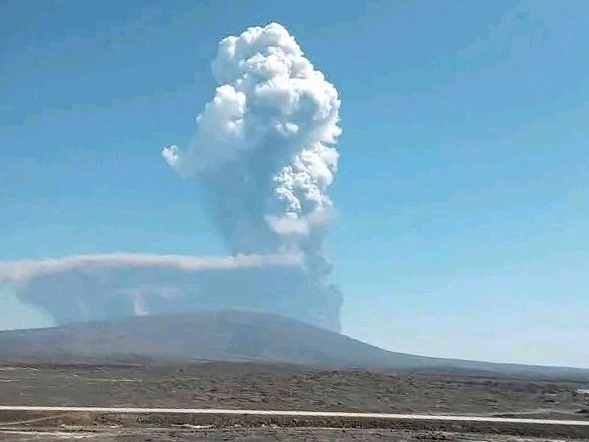 In this photo released by the Afar Government Communication Bureau, ash billows from an eruption of the long-dormant Hayli Gubbi Volcano in Ethiopia's Afar region.