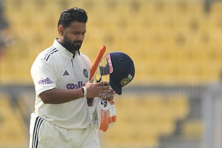 India's captain Rishabh Pant walks back to the pavilion after his dismissal during the third day of the second Test cricket match between India and South Africa at the Barsapara Cricket Stadium in Guwahati on November 24, 2025.