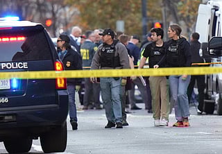 Members of law enforcement respond to a shooting near the White House.