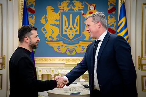 In this photo provided by the Ukrainian Presidential Press Office, Ukrainian President Volodymyr Zelenskyy, left, shakes hands with U.S. Secretary of the Army Dan Driscoll in Kyiv, Ukraine, Thursday, Nov. 20, 2025. 