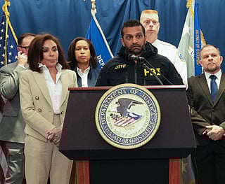 FBI Director Kash Patel speaks to the press as US Attorney for the District of Columbia Jeanine Pirro (L) looks on during a press conference regarding the shooting of two West Virginia National Guard soldiers on November 27, 2025 in Washington, DC. Two members of the West Virginia National Guard were shot blocks from the White House in what authorities are calling a targeted shooting.