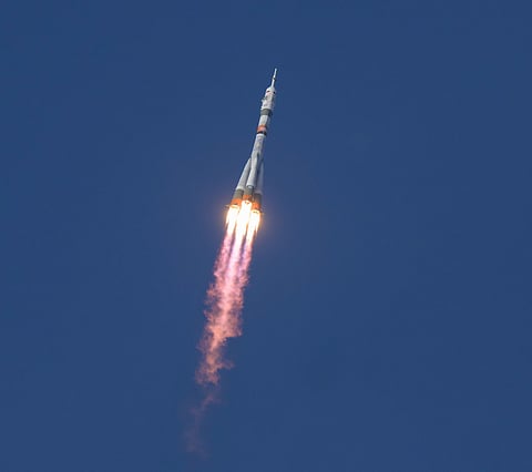 In this handout photograph taken and released by NASA, a Soyuz 2.1a booster rocket with the Soyuz MS-28 spacecraft carrying the Expedition 74 crew of Roscosmos cosmonauts Sergey Kud-Sverchkov and Sergei Mikaev and NASA astronaut Chris Williams, blasts off to the International Space Station (ISS) from the Russian-leased Baikonur cosmodrome in Kazakhstan. File photo taken on November 27, 2025.