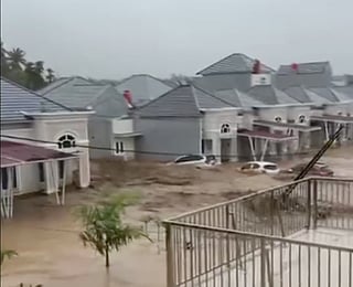 A screengrab taken from a video showing flooding in Lumin Park Housing Complex in Lubuk Minturun, Padang, West Sumatra, Indonesia on Thursday (Nov. 27, 2025).