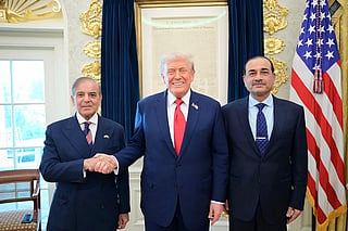This handout photograph released by Pakistan's Prime Minister Office on September 26, 2025, shows Pakistan's Prime Minister Shehbaz Sharif (L), Army Chief and Field Marshal Syed Asim Munir (R) posing with US President Donald Trump (C) at the White House in Washington, DC. File photo for illustrative purpose only