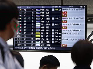 The departures display board shows All Nippon Airways' multipule flights cancellation at Haneda airport in Tokyo Saturday, November 29, 2025. 