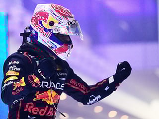Red Bull driver Max Verstappen of the Netherlands celebrates after winning the Qatar Formula One Grand Prix, at the Lusail International Circuit, in Lusail, Qatar, Sunday, Nov. 30, 2025. 