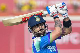 India's Virat Kohli watches the ball after playing a shot during the first one-day international (ODI) cricket match between India and South Africa at the JSCA International Stadium in Ranchi on November 30, 2025.