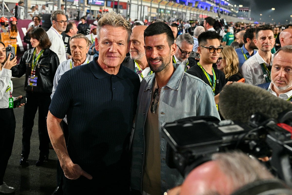 British celebrity chef Gordon Ramsay (Centre-L) and Serbian tennis player Novak Djokovic pose for a picture ahead of the Formula One Qatar Grand Prix at the Lusail International Circuit in Lusail on November 30, 2025.