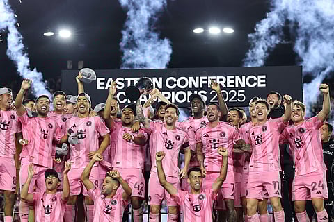 Lionel Messi #10 of Inter Miami CF celebrates with the Champion's trophy after winning the the Audi 2025 MLS Cup western conference final match between Inter Miami CF and New York City FC at Chase Stadium on November 29, 2025 in Fort Lauderdale, Florida.